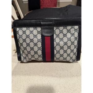 Vintage Gucci Parfums GG monogram clutch bag with a navy and red stripe
